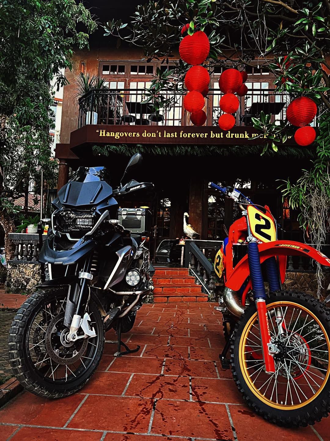 Motorbikes and red lanterns at the front door