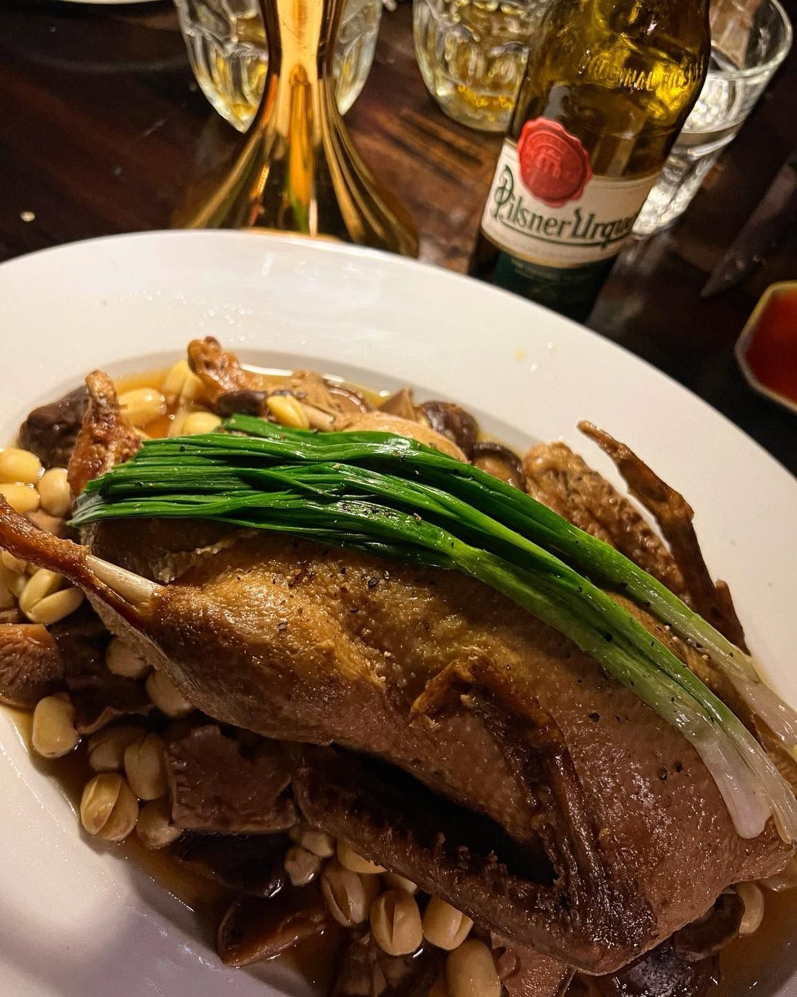 Braised duck with mushrooms and spring onion
